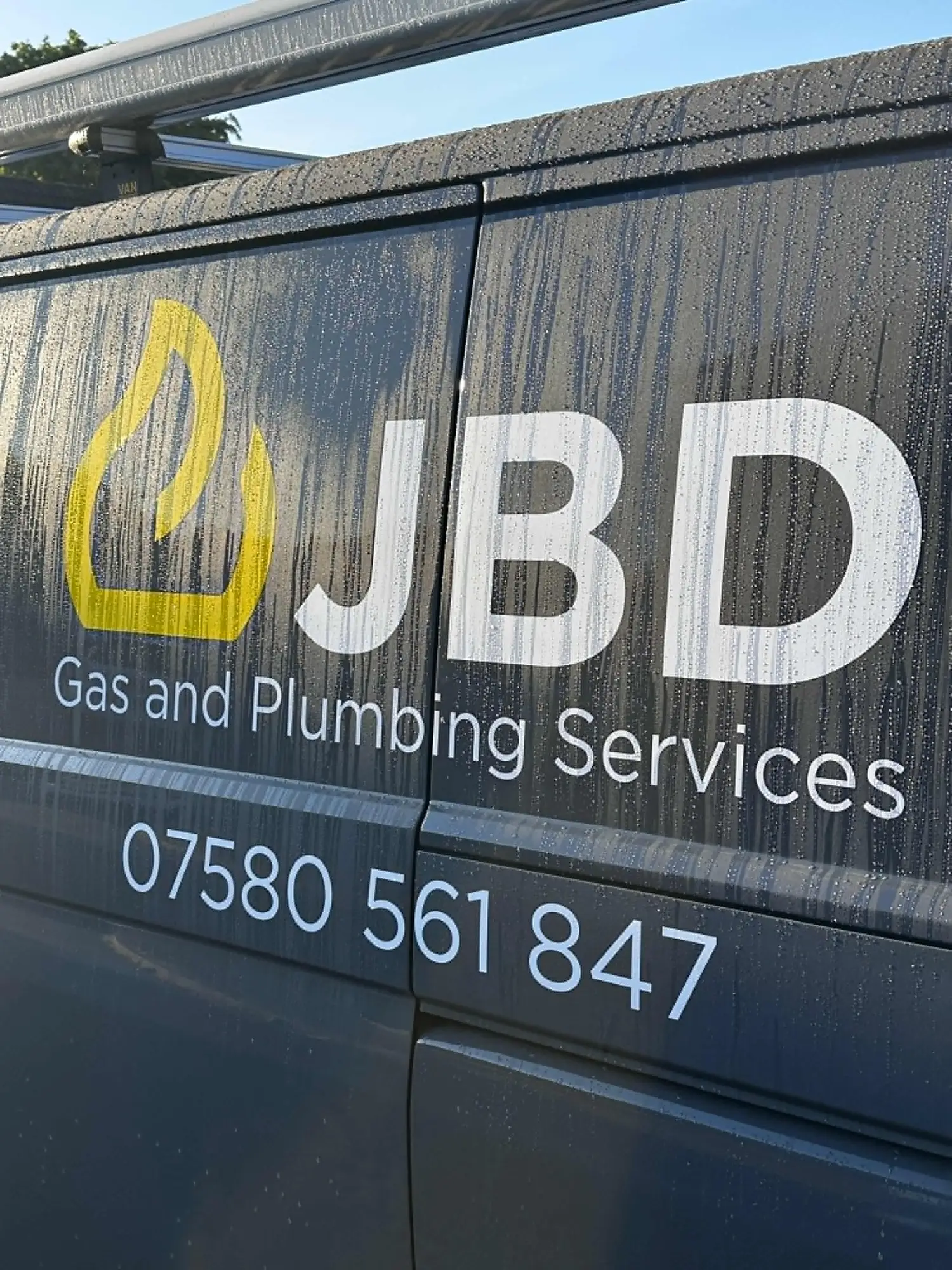 BD Gas and Plumbing Services branded work van